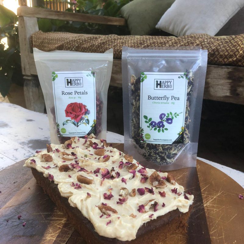 butterfly pea, rose petal, and maca carrot cake